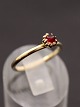 8 carat gold 
ring size 53 
with red stone 
item no. 596737