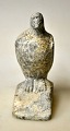 Greenlandic 
soapstone 
figure of a 
seated 
peregrine 
falcon, 20th 
century. 
Signed: Josef 
Josefsen ...