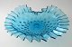 Ruffled 
business card 
bowl Fyns 
Glasværk, blown 
in eye optics 
in lake blue 
glass, c.1900. 
With ...