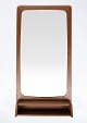 Teak mirror 
from the 1960s. 
The frame is 
made of teak 
wood, which 
gives the 
mirror a warm 
and ...