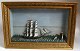 "Half-Ship" in 
showcase, 
painted wood, 
19th century. 
Sailingship 
Hanne. 
Dimensions: 50 
x 75 cm.