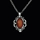 Georg Jensen. 
Sterling Silver 
Pendant with 
Amber.
Limited and 
larger version 
of the 1989 ...
