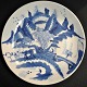 Chinese blue 
painted 
porcelain dish, 
19th century. 
Decoration of 
houses in 
landscape. 
Signed. ...