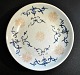 Chinese 
porcelain 
plate, 19th 
century. 
Hand-painted 
decorations in 
red and blue. 
Diameter: 23.5 
...