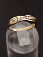 8 carat gold ring  with several clear stones