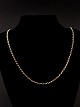 Sterling silver 
gold-plated 
necklace 60 cm. 
W. 0.25 cm. 
subject no. 
597246