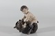 Royal 
Copenhagen 
Figurines
Figurine of 
Faun with bear 
no. 648
Height 15 cm
Length 15 ...