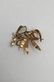 Evald Nielsen 
18K Gold Brooch 
with Opal 
Measures 4.9 
cm x 4.9 cm  
(2.32 inch x 
2.32 inch) ...