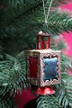 Christmas tree 
decoration in 
the form of a 
small tin 
lantern from 
around 1920. H: 
7.5cm.