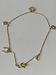 Sweet and 
feminine gold 
bracelet in 14 
carat gold, 
with beautiful 
pendants, e.g. 
heart and ...