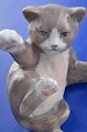 Royal 
Copenhagen 
figurine. 
Kitten lying 
nr. 302. Height 
7 cm. length 8 
x 8 cm. 1. 
Quality, fine 
...