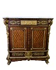 Antique French 
Empire style 
inlay 
sideboard. The 
sideboard 
features 
detailed inlay 
inlay. The ...