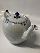 Royal 
Copenhagen 
Princess, 
Teapot.
Decoration 
number 143.
1. sorting.
Length 23.5 
cm.
Neat ...