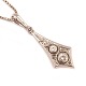 14kt white gold 
Art Deco 
pendant with 
four diamonds 
circa 1920-30
Size: 32x10mm