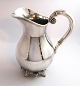 Svend Toxværd. 
Sterling silver 
pitcher with 
grapes, 
hammered. 
Height 22 cm.