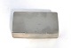 Silver pill box 
(830). Length 6 
cm. Width 3.2 
cm. Produced 
1945.