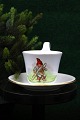 Old 
high-handled 
Christmas cups 
from Bing & 
Grondahl 
with Christmas 
motifs. Cup H: 
9.3 cm. Cup ...