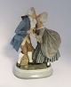 Royal 
Copenhagen. 
Porcelain 
figure. The 
kiss. Design: 
Chr. Thomas. 
Model 2046. 
Height 22 cm. 
(1 ...