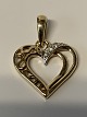 Gold Pendant 
Heart with 
clear stones in 
14 Karat Gold
Stamped SD 585
Height with 
awl 15.73 ...