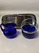 Small sugar 
bowl and 
creamer in blue 
glass, with a 
silver stained 
tray. The sugar 
bowl with a ...