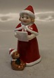 Royal 
Copenhagen 0278 
RC  2022 
Santa's Wife 10 
cm Pixie. 
Married to 
Father 
Christmas 
Singing ...