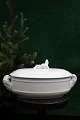 Old Swedish 
oval Christmas 
terrine in 
white porcelain 
with a lying 
elf on the lid 
and 2 elf ...