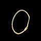 18k Gold Tennis 
Bracelet with 
Diamonds.
A continuous 
line of 77 
diamonds og 
0.03 ct each on 
...