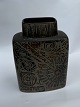 Brown baca vase 
from Royal 
Copenhagen 
designed by 
Nils Thorsson. 
Fashion number 
870/3121. In 
...