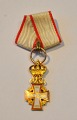 Miniature 
knight's cross 
of the 1st 
degree in gold, 
1912 - 1947, 
Denmark. With 
ribbon. Height: 
5 ...