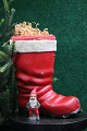 Old Santa boot 
in painted 
papier-mâché 
from around 
1920 
(candy 
container) H: 
18cm. (The 
little ...