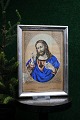 Old 19th 
century silver 
frame (wood 
coated with 
silver) with a 
fine old 
picture of 
Jesus. 
23x16.5cm.