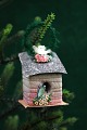 Old Christmas 
tree ornament 
made of 
cardboard, 
paper and 
glossy pictures 
in the shape of 
a small ...