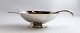 Christofle. 
Christian 
Fjerdingstad. 
Sauce bowl & 
sauce spoon of 
silver-plated 
metal. Length 
20 cm.