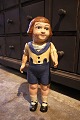 Decorative, old 
doll in painted 
papier-mâché 
with a fine 
patina. 
H: 47cm. Arms 
and head can be 
...