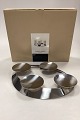 Georg Jensen 
Candlestick - 
Four 2010. 
Stainless steel 
Advent 
candlestick for 
block candles. 
...