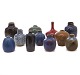 Collection of 
ten miniature 
stoneware vases 
by Nils ...