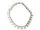 Danish Sterling silver
Gilded necklace with white enamel