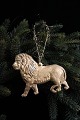 Antique Dresden Christmas decoration from 1900 in the shape of a lion in gold 
painted papier-mâché.