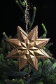 Antique Dresden Christmas ornament in the shape of a star in gold-plated 
papier-mâché from 1900. Dia. 14.5cm.