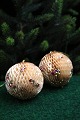 Old Christmas balls made of paper with gold glitter...