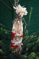 Antique Christmas tree ornament from around 1920-30 made of cardboard, tissue 
paper and glossy image...