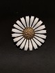 Georg Jensen 
gold-plated 
sterling silver 
daisy brooch D. 
3.2 cm. with 
enamel subject 
no. 601384