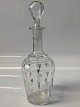 Handmade glass carafe with beautiful decoration with hearts and stars.