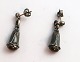 Georg Jensen. 
Sterling ear 
studs (925). 
Length 3 cm