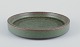 Annelise and 
Per 
Lindemann-
Schmidt for 
Palshus.
Large ceramic 
dish with glaze 
in greenish ...