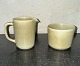 DELICIOUS SET: 
Cream jug and 
sugar bowl in 
ceramic from 
Palshus. 
Covered in 
green hare fur 
...