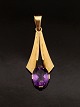 14 carat gold 
pendant weight 
5.7 cm. L. 3.9 
cm. with 
amethyst 0.9 x 
1.2 cm. stamped 
585 item no. 
...