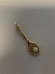 Racket with 
ball, 
Pendant/Charms 
in 14 carat 
gold.