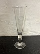 Champagneglas 
eller 
Champagnefløjte 
nr. 4 i 
Holmegaard 
katalog 1853. I 
god stand. H. 
17 cm