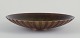 Tinos, Denmark
Large bowl in 
solid bronze. 
Art Deco. 
Heavy bowl in 
high quality.
Grooved ...